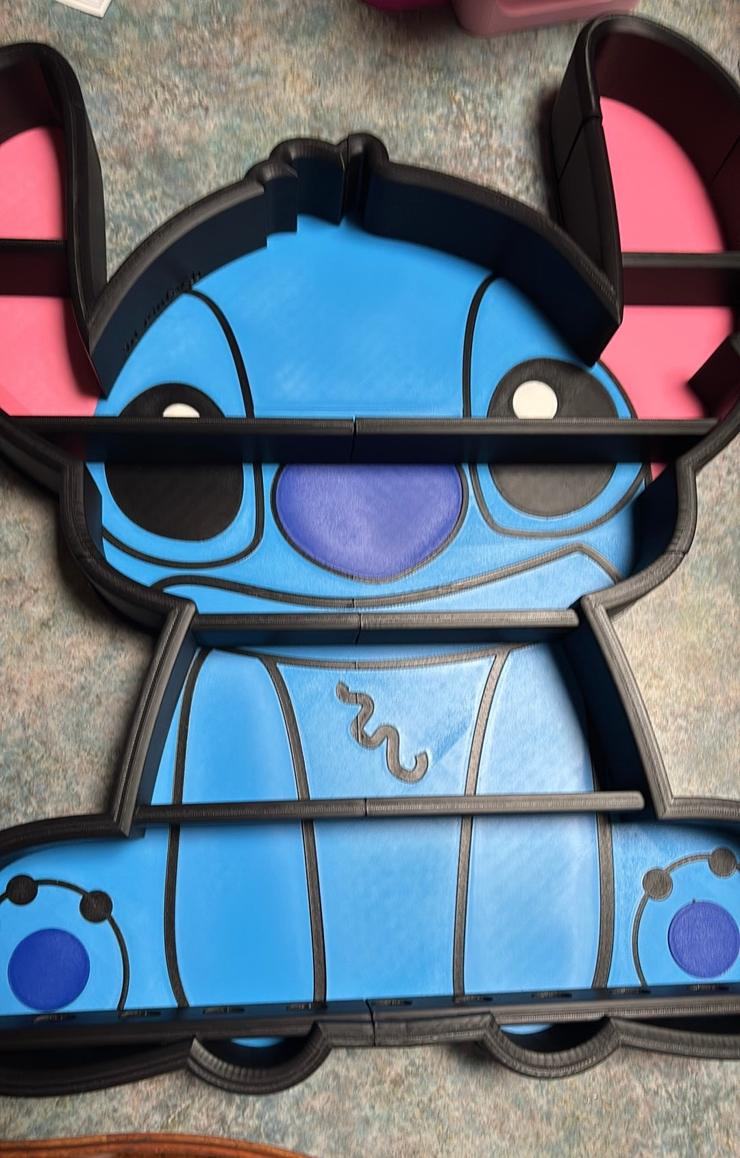 Blue alien tonies shelf