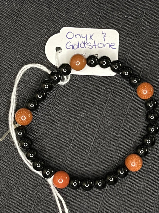 Onyx and goldstone beaded bracelet